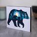 small bear and cub angled view